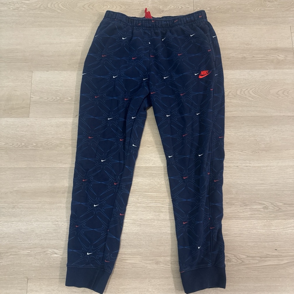 Nike Men's Navy Joggers with Red and White Accents